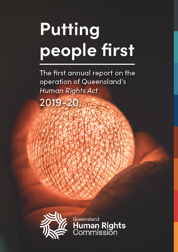 Cover of 'Putting people first' report. Full page photograph, a close up of a hand holding a light. The light is a ball and is a soft orange colour, wond round with fine wire. The rest of the image is in darkness. Across the top third of the photo, white text reads "Putting people first: The first annual report on the operation of Queensland's Human Rights Act 2019-20". The Commission's logo in white is centered at the bottom of the image.